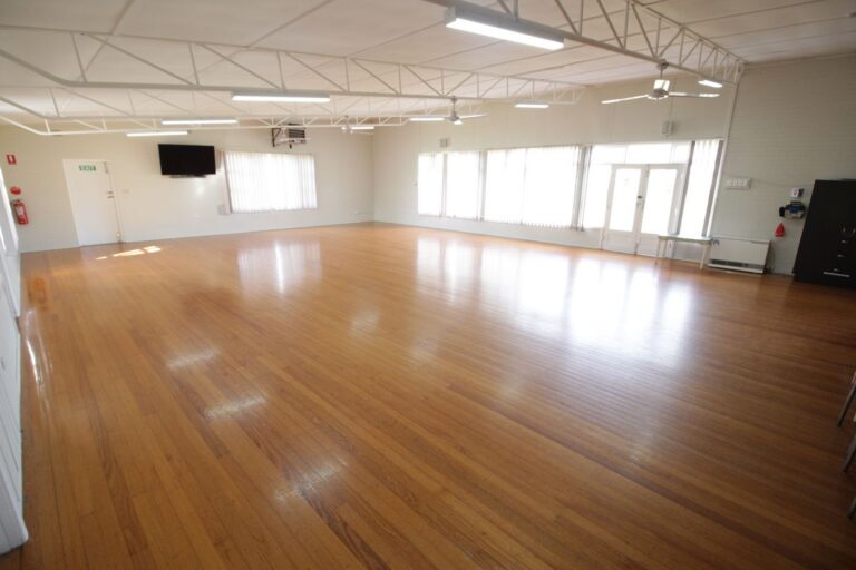 The main hall from the far end, with a wall of windows down one side