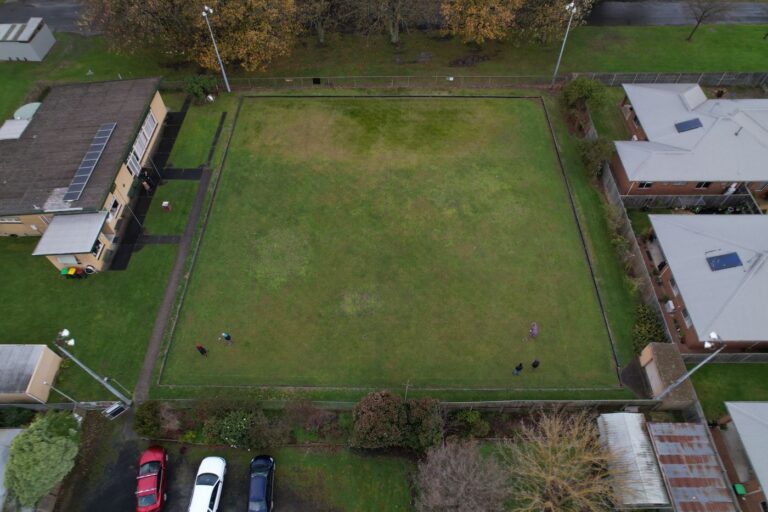The green at the Hub from above, showing its full size with buildings on two sides