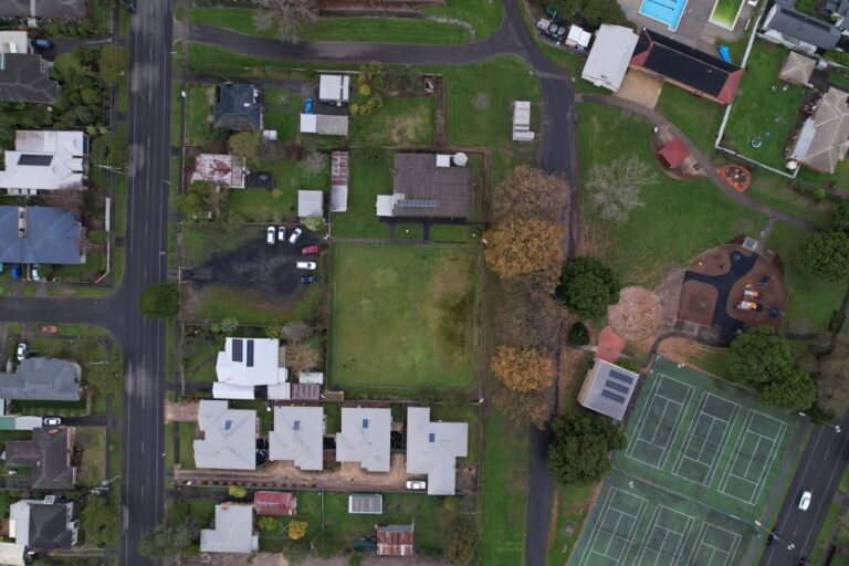 An aerial view of the Hub showing the building, the green, the carpark and the street
