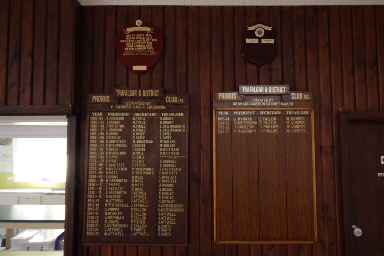 Timber honour boards inside the hall listing past presidents and secretaries of the bowls club